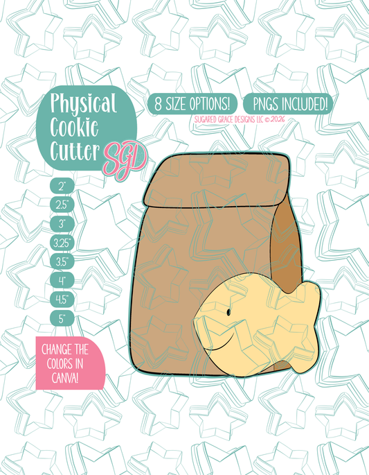 Illustrated Goldfish cracker and brown bag lunch, displayed on a background watermarked with a teal star pattern representing Sugared Grace Design’s brand. Text explains that the listing includes a Goldfish Lunch STL cookie cutter in multiple sizes plus editable PNG files.